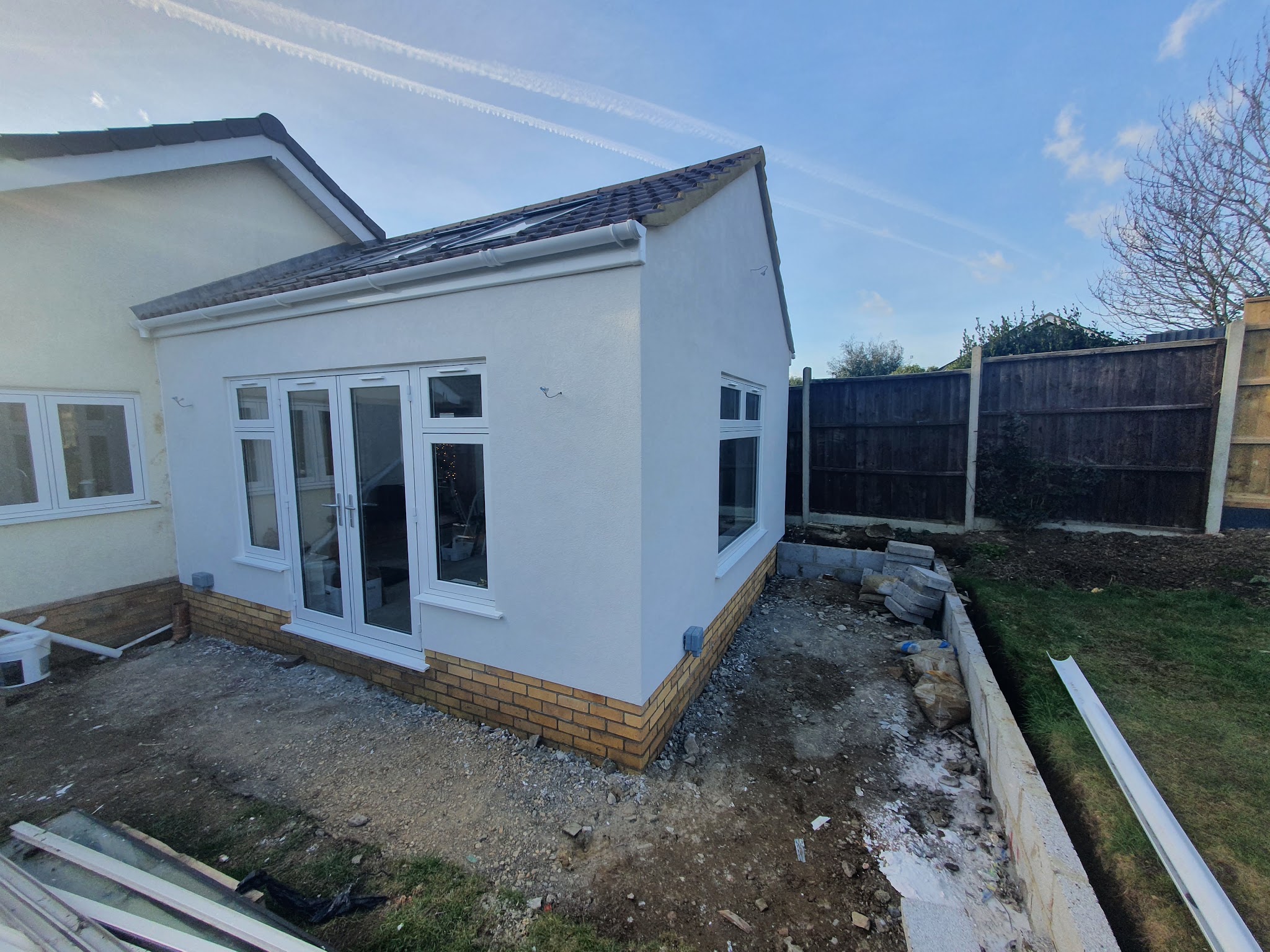New rear extension finished in white render